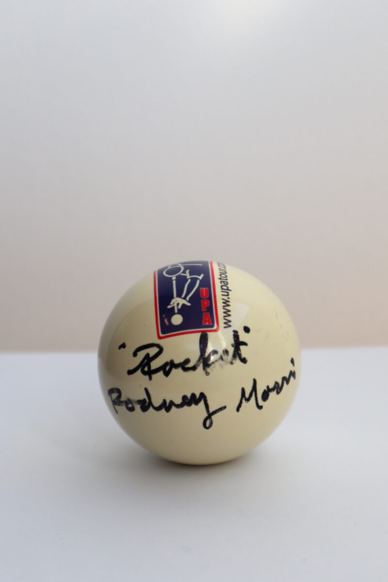 UPA Autographed Cue ball, example shows Rodney Morris's signature on UPA branded ball