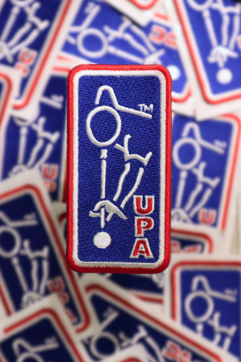 Official UPA competition patch with red,white, and blue logo