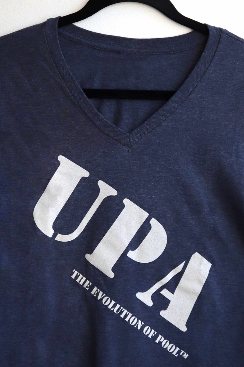 Showing front of Juniors V-Neck. Washed navy color with UPA and the evolution of pool across the chest